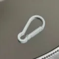 White aluminum alloy carabiner keychain hook detail view, smooth metal finish close-up. - Gourd Buckle / White