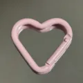 Pink heart-shaped aluminum alloy carabiner clip, close-up detail of DIY keychain accessory. - Heart Buckle / Light Pink