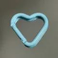Close up view of the light blue heart shaped aluminum alloy carabiner keychain hook detail. - Heart Buckle / Light Blue