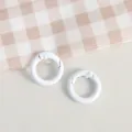 White round spring rings, metal clasps for DIY keychains and handmade jewelry crafts detail. - White