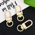 Zinc alloy swivel snap hooks, beige bag hardware clasps, DIY keychain detail view. - Off White