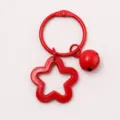 Rode ster sleutelhanger met metalen ring en bel voor DIY tasbedels en leuke accessoires. - Rood