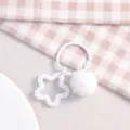 White star hollow pendant and fluffy pom-pom keychain detail view, cute bag charm accessory. - Solid Pentagram + Plush Ball + Ring / White