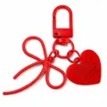 Red alloy keychain featuring a cute bow and an engraved heart pendant for bags and keys. - Red