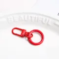 Roter Metall Federring Schlüsselanhänger DIY Schmuck Zubehör Taschenanhänger Variante. - Feder Schnalle + Tor Clip / Rot