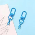 Close up of blue zinc alloy swivel keychain lobster clasp hardware DIY accessory - Gate Buckle + Lobster Clasp / Blue