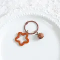 Brown star acrylic keychain pendant dopamine cute bag charm earphone case accessory - Brown Solid Five-Pointed Star + 3cm Ring + 14mm Bell