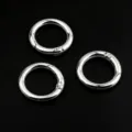 Close-up detail view of silver round spring rings metal hardware accessories for DIY. - No.23 Spring Buckle / Silver