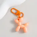 Niedlicher, farbiger Ballonhund Schlüsselanhänger, modischer Taschenanhänger für Damen - Orange