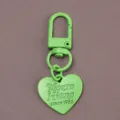 Green alloy heart keychain bag pendant DIY craft accessory with stylish embossed lettering. - Green