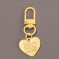 Yellow alloy keychain with heart shaped charm DIY bag pendant accessory and clasp. - Light Yellow