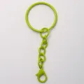 Portachiavi in metallo verde vibrante con moschettone, ideale per ciondoli e accessori. - Verde Frutta
