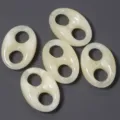 Acrylic double-hole pig nose beads detail shot showing marbled white and beige DIY jewelry accessory. - 22X33mm (Hole 9mm) / Transparent Yellow
