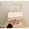 Chic off-white top-handle crossbody bag for women, stylish woven detail square handbag. - Off White