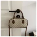 Vintage monogram print crossbody bag with top handles and brown leather trim for women - Beige