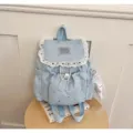 Vue détaillée du joli sac à dos décontracté bleu clair pour femme avec motif étoiles et dentelle. - Avec Pendentif (JH6014) / Bleu