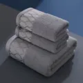 Premium cotton towel set in elegant grey with geometric border, soft, absorbent, ideal for home. - 35*70cm / Grid Gray