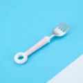 Cute stainless steel baby fork with pink polka dot silicone handle for toddlers. - Donut Forks / Pink