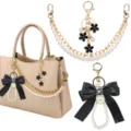 Parelketting tasband met zwarte strikhanger, elegante accessoire detailweergave. - Stijl 14