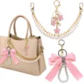 Exclusieve parelketting handtas hanger met roze strik sleutelhanger decoratie set. - Stijl 17