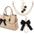 Parelketting tasbedel met zwarte strik, elegant accessoire voor handtas en chique sleutelhanger. - Stijl 2