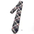 Detailed view of classic plaid tie with retro aesthetic, premium fabric texture for daily style. - Black Beige Yellow Wine Red Plaid 145*7cm