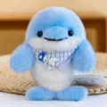 Cute blue and white dolphin plush toy with bib, soft stuffed animal doll for table decor. - Lazy Capybara / 17cm