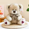 Cute plush teddy bear toy with plaid bow tie and heart foot pads, soft stuffed doll for kids. - Brown Ribbon Style / 32cm