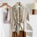 Green floral silk blend scarf ribbon detail shot, elegant lifestyle hanging display. - Light Green Multi-Floral