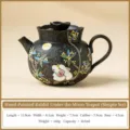 Black ceramic teapot with hand-painted rabbit and osmanthus pattern, ideal for home use. - Wancen Flower Bud Teapot (Simple Pack) / 165ml