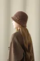 Elegant brown wool bucket hat with delicate floral rhinestone side detail for vintage winter style. - Bucket Hat / Coffee