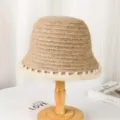 Detailed view of women knit bucket hat, casual warm winter retro hat in beige brown style. - One Size / Khaki With Contrast Edge