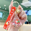 Llavero con purpurina líquida navideña con bonito colgante de Papá Noel y correa. - Papá Noel