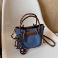 French style denim bucket bag for women, trendy autumn crossbody handbag with brown PU trim. - Hanging Charm Style / Dark Blue