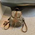 Casual dames rugzak van retro gewassen canvas en bruine lederen details voor dagelijks gebruik. - Zonder hanger / Donkerbruin