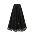 Detailed view of the elegant black high-waisted pleated long skirt with intricate cut-out hem. - One Size / Bottoms