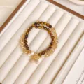 Bracciale doppio in occhio di tigre Maillard rétro cinese fatto a mano con perle fiocco. - Stile Ciondolo a Fiocco