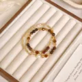 Bracciale di perle a doppio strato Maillard fatto a mano vintage con occhio di tigre e conchiglia. - Stile Conchiglia di Bambù