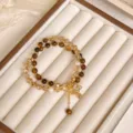 Bracciale doppio artigianale con perle occhio di tigre cristallo e ciondolo pianeta retro - Stile Ciondolo Pianeta