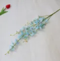 Close-up detail of artificial blue dancing orchid silk flower branch, perfect for home decor display. - Blue