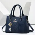 Dark blue textured leather handbag casual commuter tote bag with elegant golden hardware - Sapphire Blue