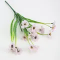 Artificial flower bunch with purple patterned petals and green stems for home decor. - White