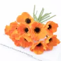Stunning close-up view of vibrant orange artificial poppy flowers bouquet for decoration. - Orange