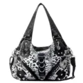Bolso bandolera de moda para mujer con estampado animal en blanco y negro y anillas. - Negro
