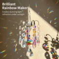 Close-up view of crystal sun catcher casting stunning rainbow light reflections on wall. - Diamond Style