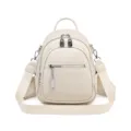 Mochila de cuero suave para mujer elegante moda casual de viaje con dijes de metal - Blanco