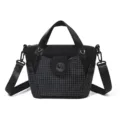 Stylish black nylon women's shoulder bag with grid pattern, crossbody and handbag design. - Black