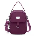 Elegante bolso bandolera morado para mujer con múltiples cremalleras y correa ajustable. - Púrpura