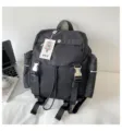 Mochila negra de nailon impermeable, mochila de viaje y para portátil duradera con bolsillos. - Negro