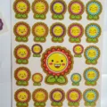Colorful cartoon smiley flower reward stickers, cute bubble sticker sheet for kids and students. - Cartoon Smiley Sticker